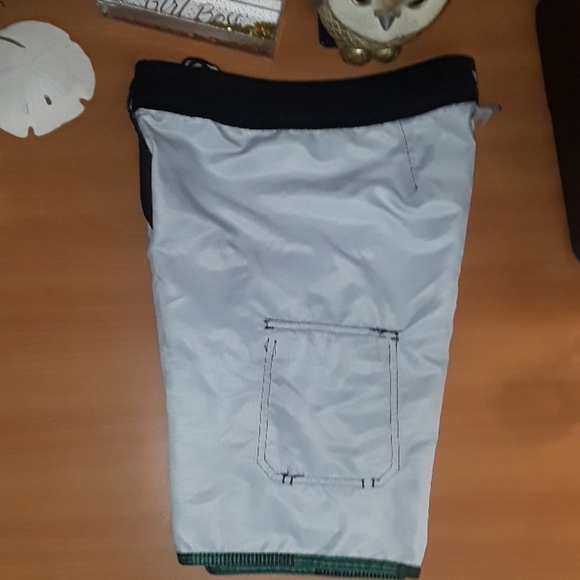 Boys size 10 DC brand green & black swim trunk. 🏊 - Picture 7 of 8